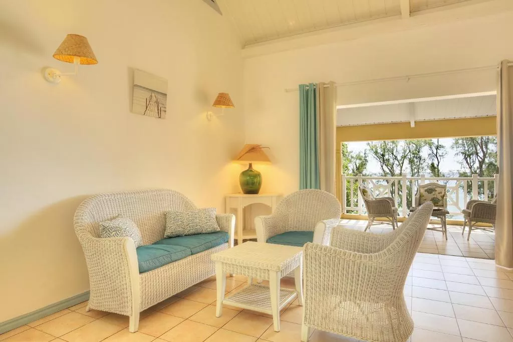 Cocotiers Hotel Rodrigues with outdoor pool, beach loungers, and ocean view